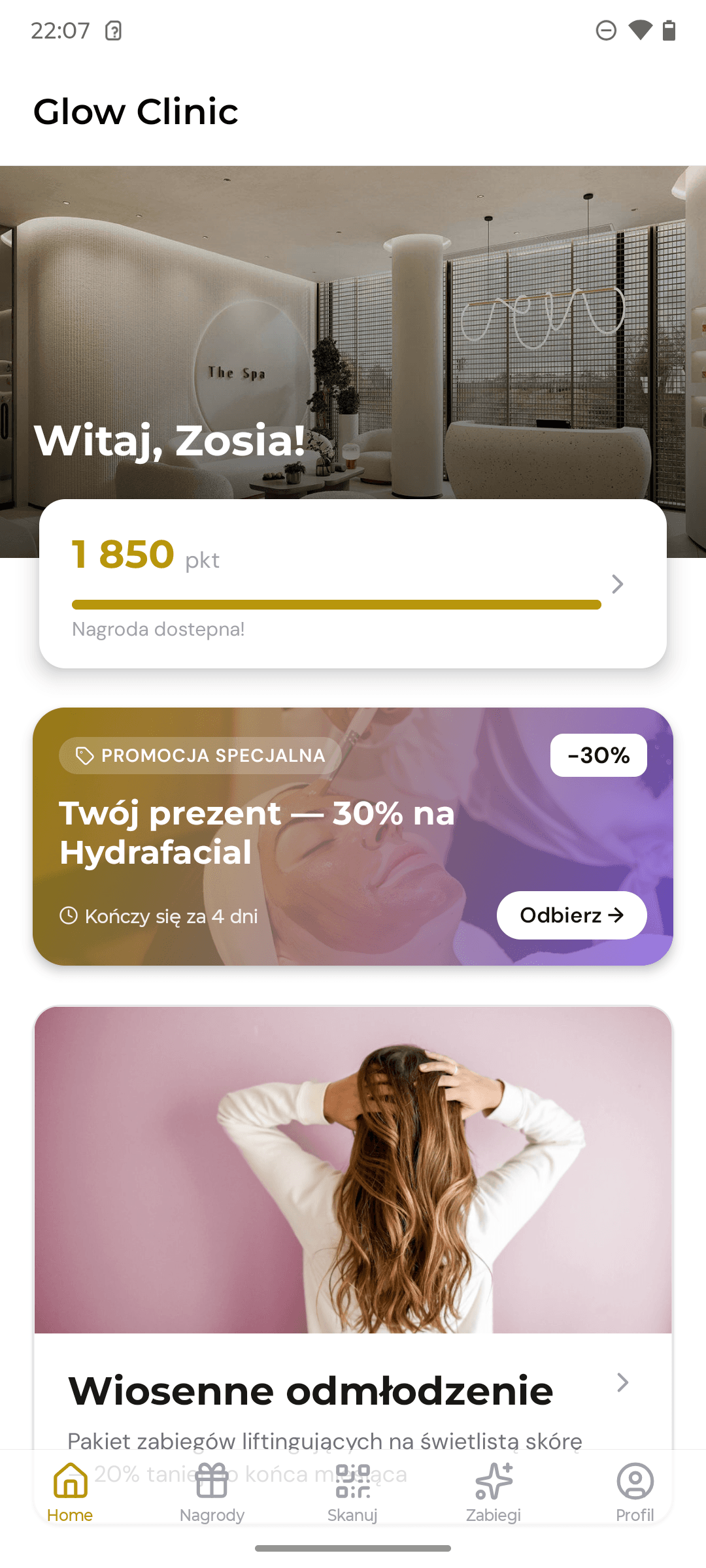 Ekran główny aplikacji Auramatic — punkty lojalnościowe, promocje i nagrody dla pacjentów kliniki